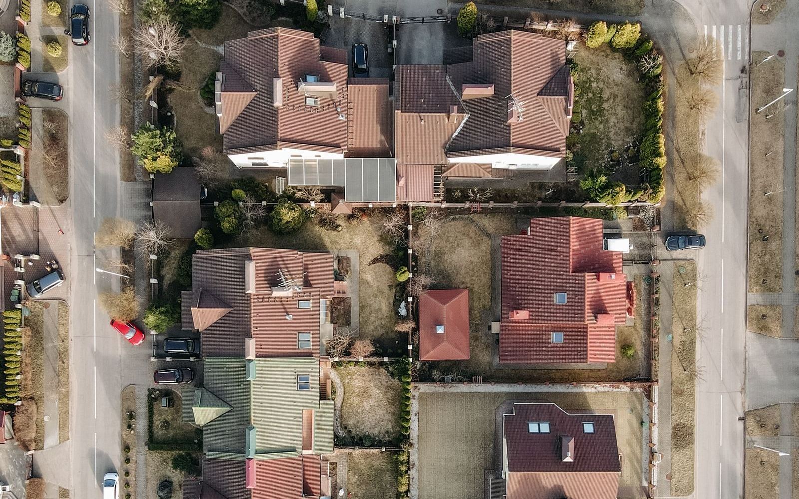 Aerial view over the rooftops of a desert suburban neighborhood