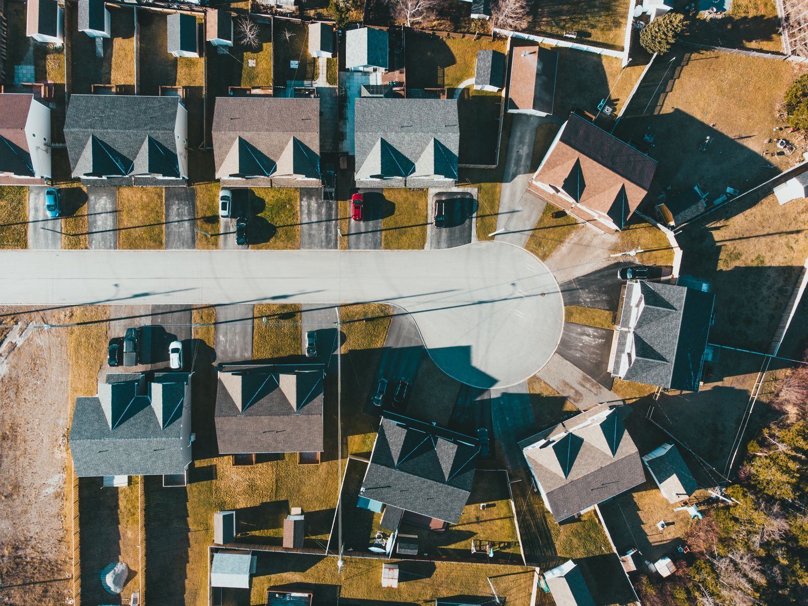 A row of similar single-family homes in a suburban neighborhood